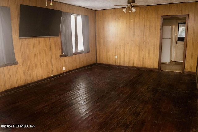 762 N Walnut St, Starke, FL 32091 - unfurnished room with a ceiling fan, wood-type flooring, and wooden walls