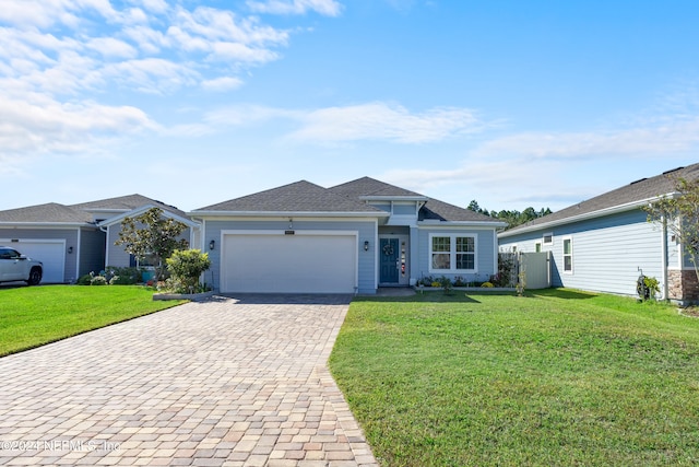 ranch-style house with a front yard and a garage