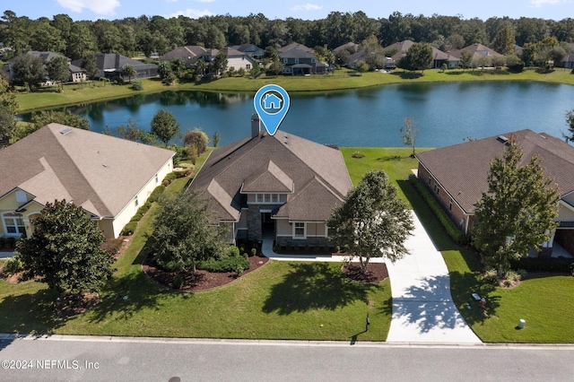 drone / aerial view with a water view