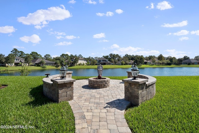 view of patio / terrace featuring a water view