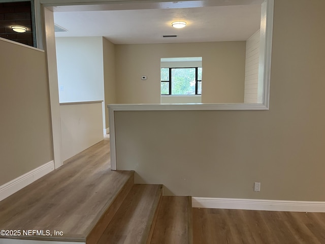 interior space with hardwood / wood-style floors