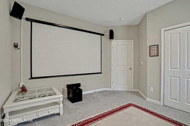 home theater featuring carpet