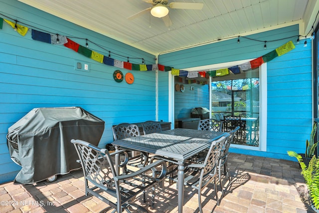 view of patio / terrace with area for grilling and ceiling fan