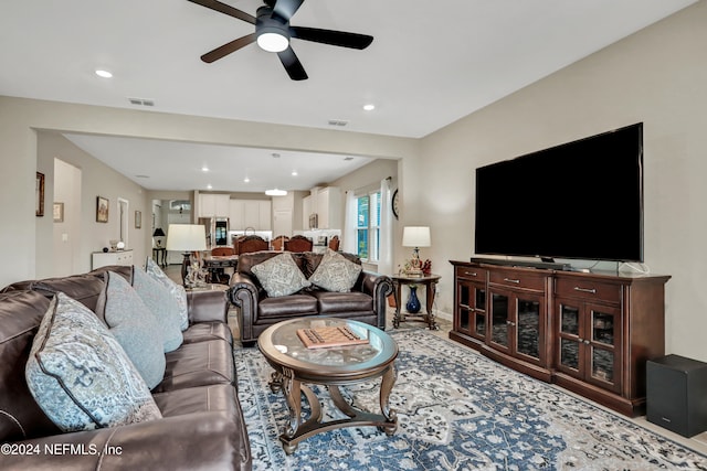 living room with ceiling fan