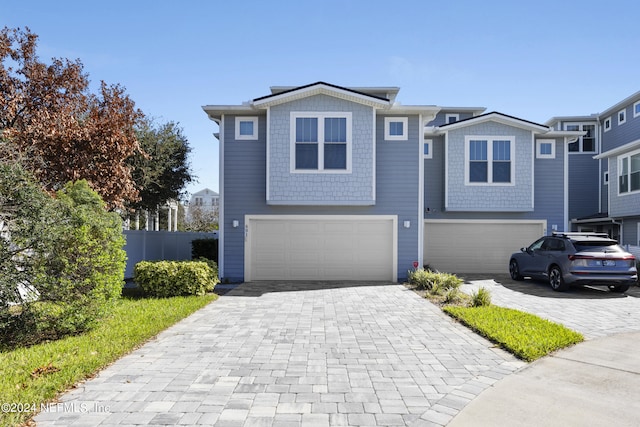 front of property with a garage