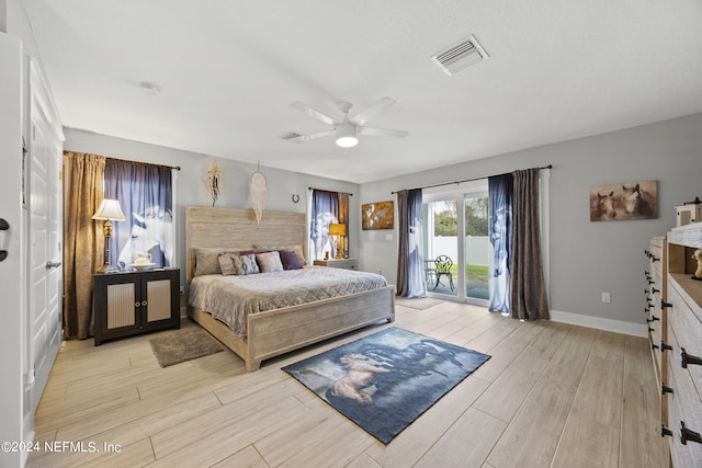 bedroom featuring ceiling fan, access to outside, and light wood-type flooring