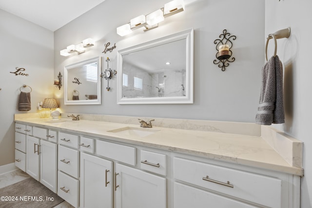 bathroom with vanity and an enclosed shower