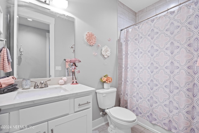 full bathroom with vanity, shower / bathtub combination with curtain, toilet, and tile patterned flooring