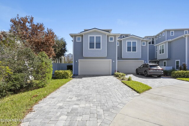 front facade with a garage