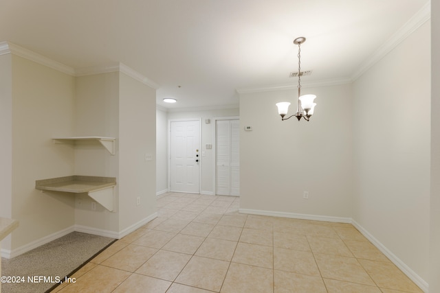 tiled empty room with crown molding and a chandelier