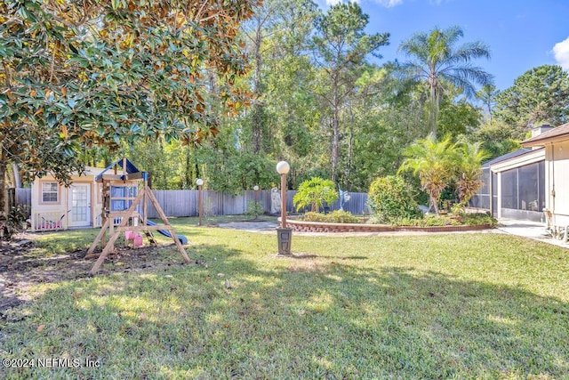 view of yard with a playground