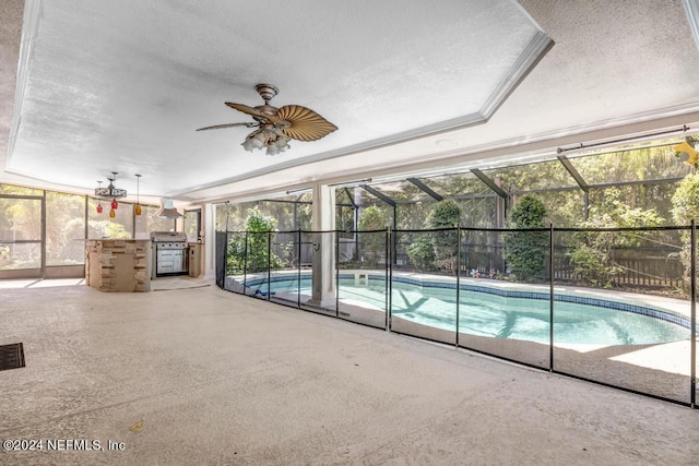 view of pool with area for grilling and ceiling fan