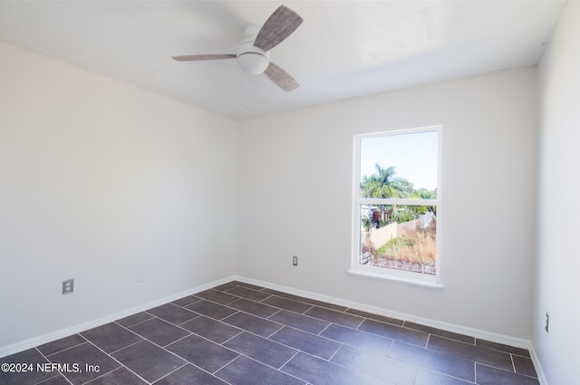 unfurnished room featuring ceiling fan