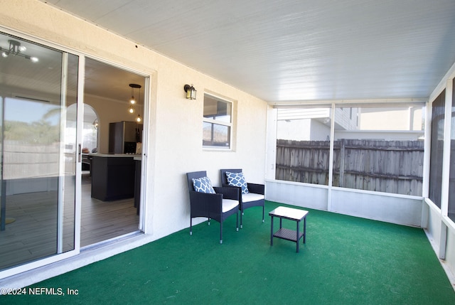 view of unfurnished sunroom