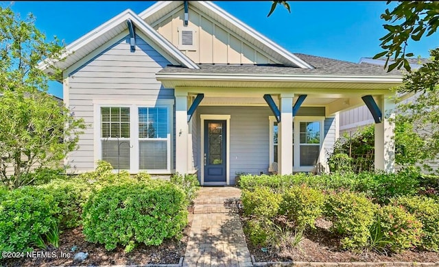 bungalow-style home with a porch