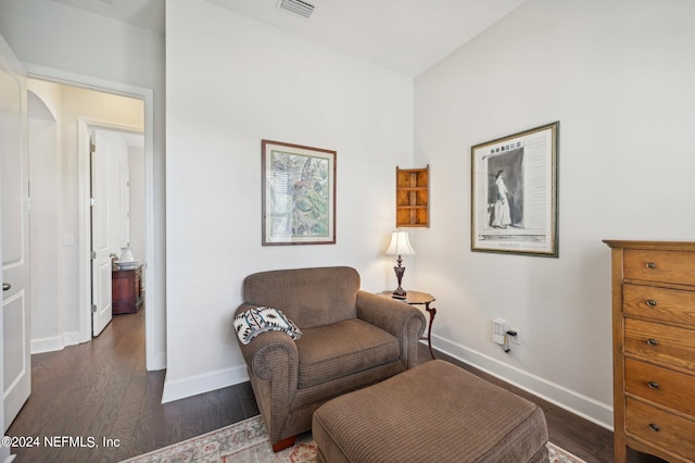 living area with dark wood-type flooring