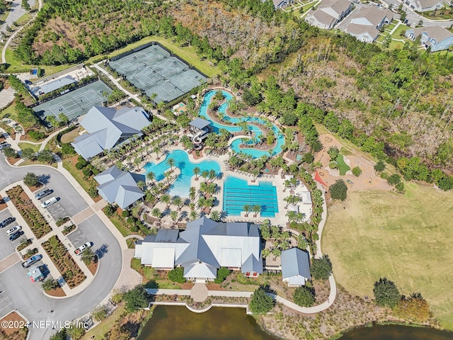 birds eye view of property featuring a water view