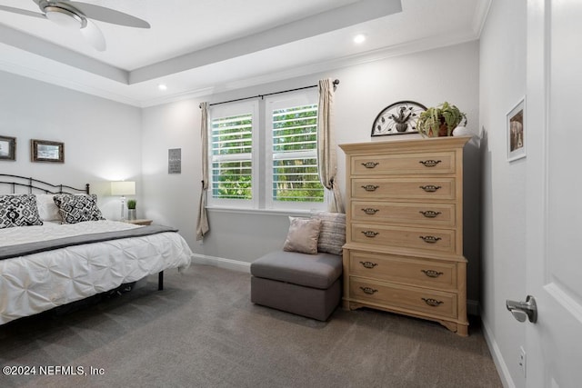 carpeted bedroom featuring ceiling fan and ornamental molding