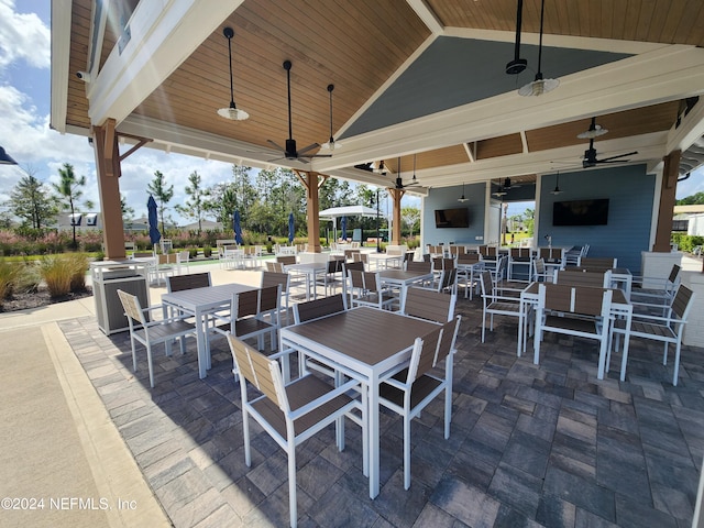 view of patio featuring ceiling fan