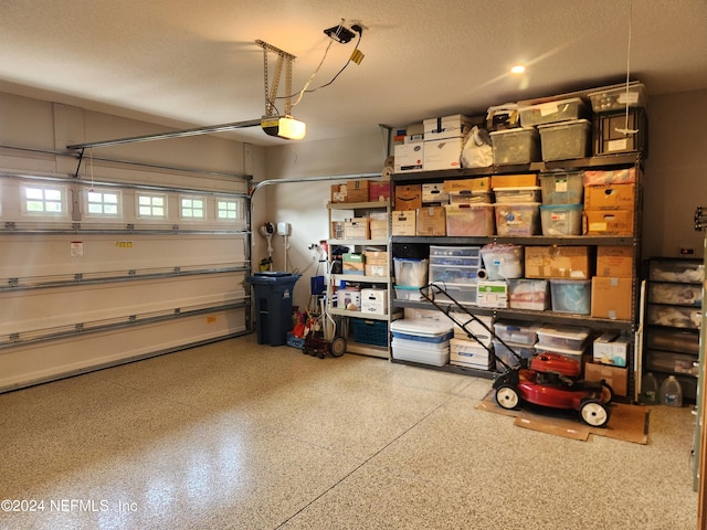 garage featuring a garage door opener