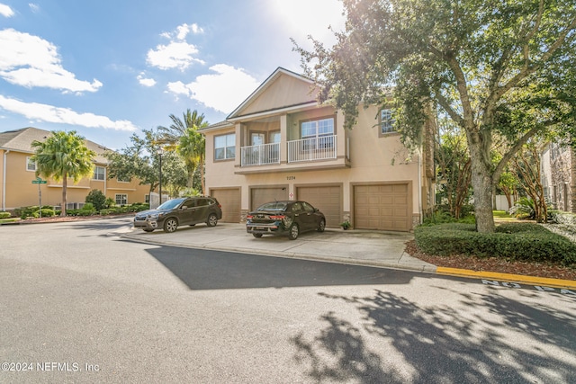 view of front of property with a garage