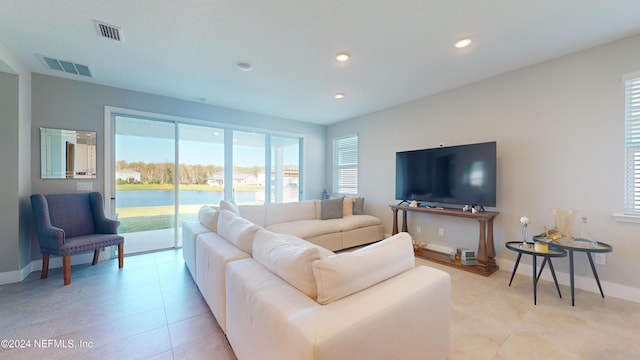 living room featuring light tile patterned floors