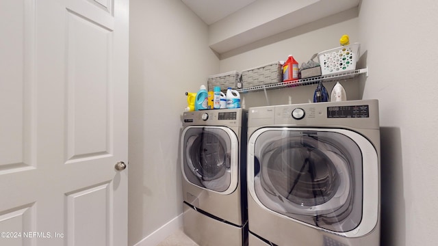 laundry room featuring washer and clothes dryer