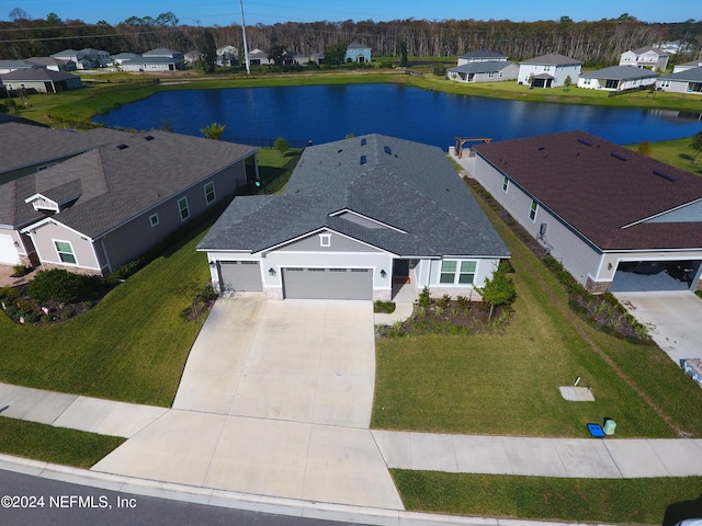 birds eye view of property featuring a water view