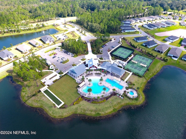 birds eye view of property featuring a water view