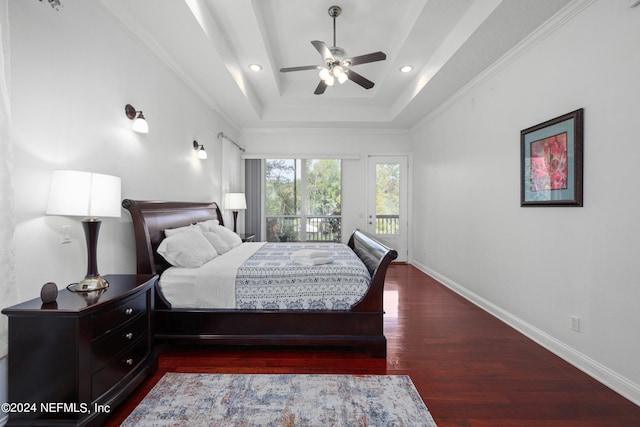 bedroom featuring access to outside, crown molding, ceiling fan, a raised ceiling, and dark hardwood / wood-style flooring