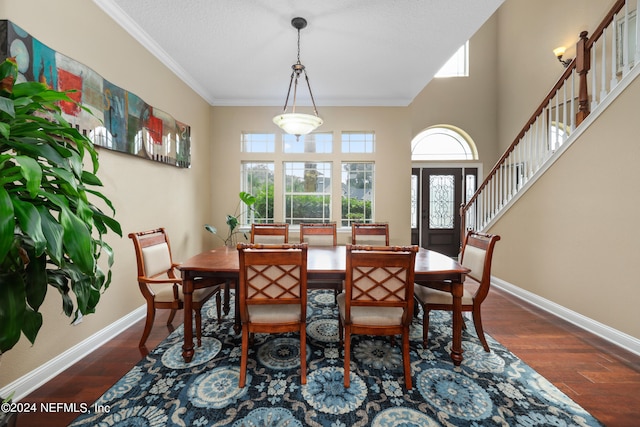 dining area featuring ornamental molding, french doors, and dark hardwood / wood-style flooring