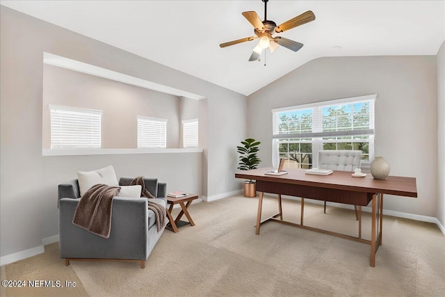 office with baseboards, light colored carpet, a ceiling fan, and lofted ceiling