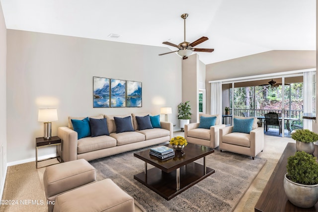 carpeted living room featuring lofted ceiling, a ceiling fan, visible vents, and baseboards