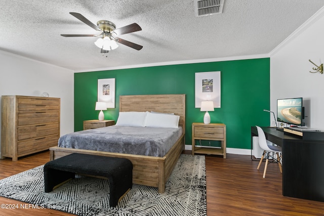 bedroom with dark wood-type flooring and a textured ceiling