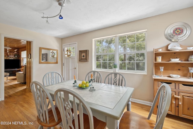 dining area featuring light hardwood / wood-style flooring