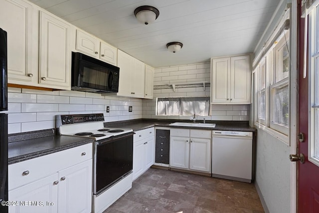 kitchen with backsplash, sink, white cabinets, and white appliances