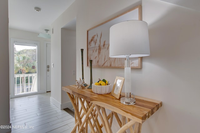 hallway featuring light wood-type flooring