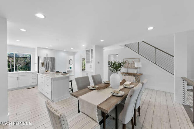 dining room featuring light hardwood / wood-style flooring