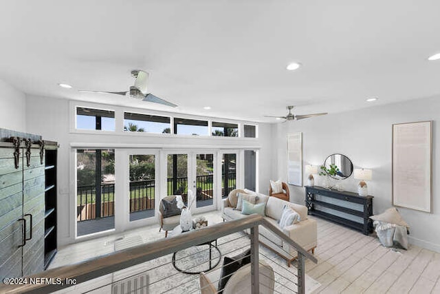 living room featuring hardwood / wood-style flooring and french doors