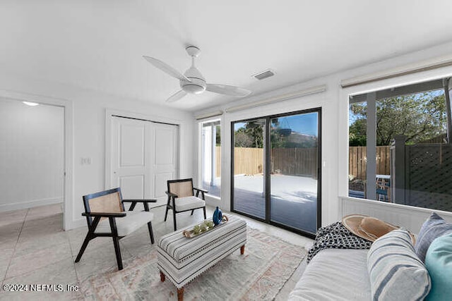 interior space with plenty of natural light and ceiling fan