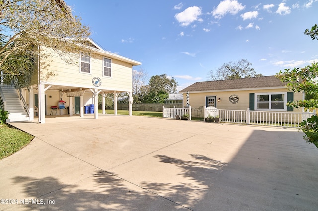 exterior space featuring a carport