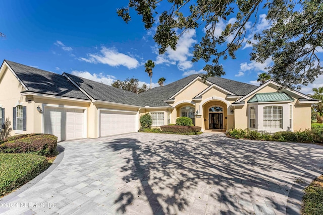 ranch-style home with a garage