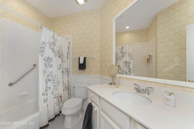 full bathroom featuring tile patterned floors, toilet, wallpapered walls, shower / tub combo with curtain, and vanity