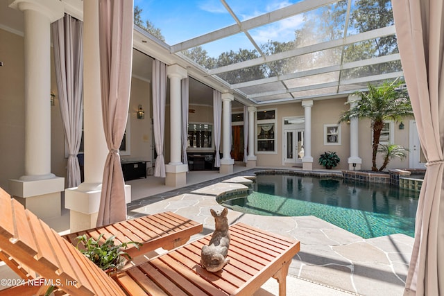 view of pool featuring a patio area, french doors, and glass enclosure