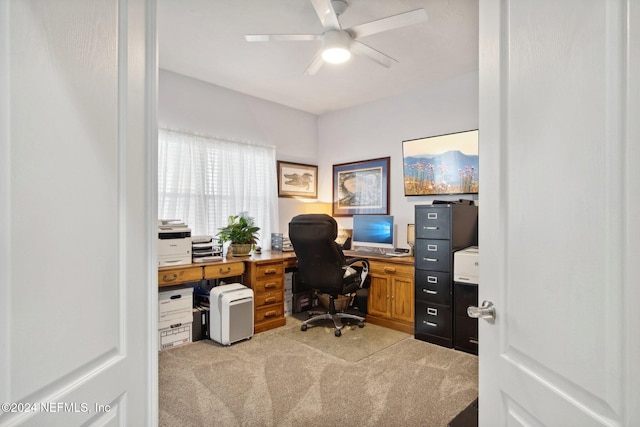 office area with light colored carpet and ceiling fan