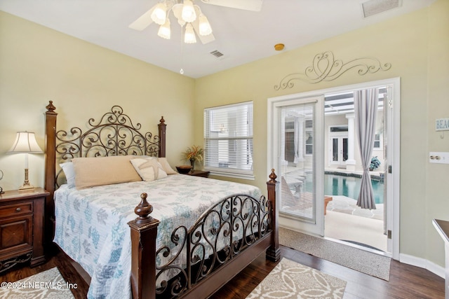 bedroom with ceiling fan and dark wood-type flooring