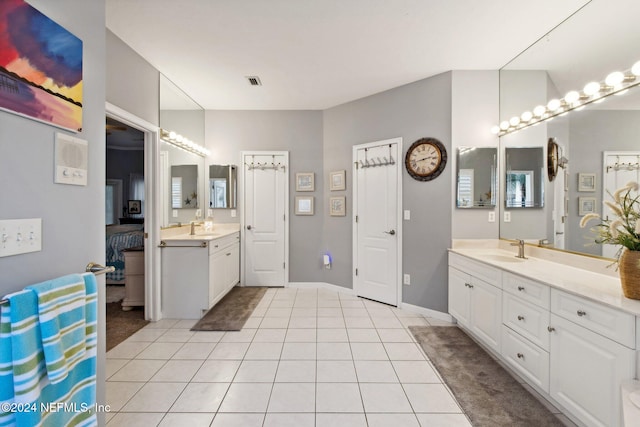 bathroom featuring vanity and tile patterned floors