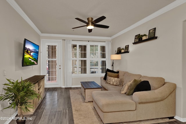 living room with crown molding, hardwood / wood-style floors, and ceiling fan