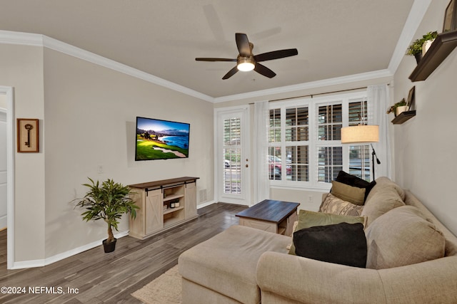 living room with crown molding, ceiling fan, and dark hardwood / wood-style flooring