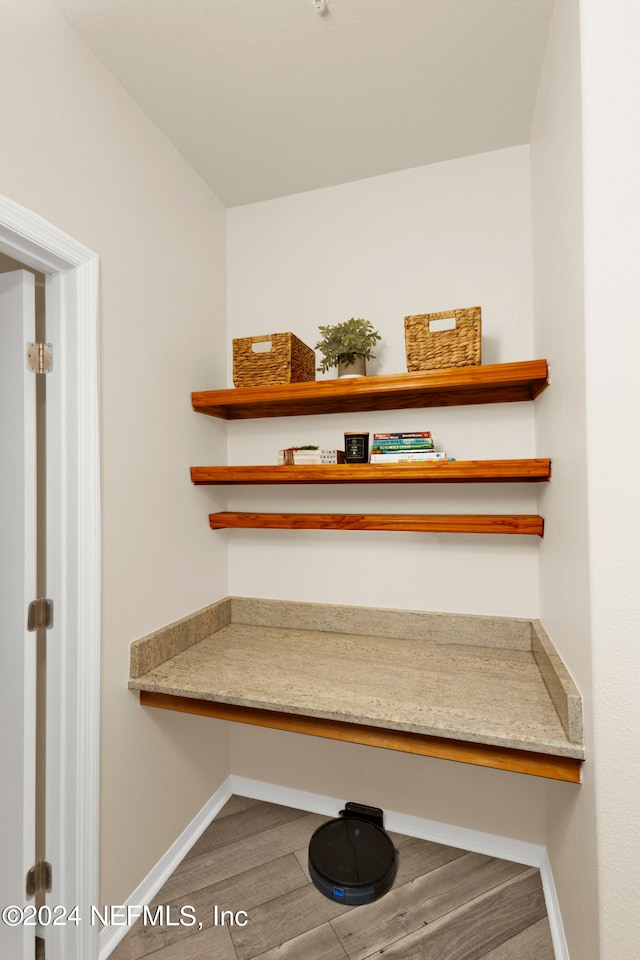 details featuring hardwood / wood-style floors